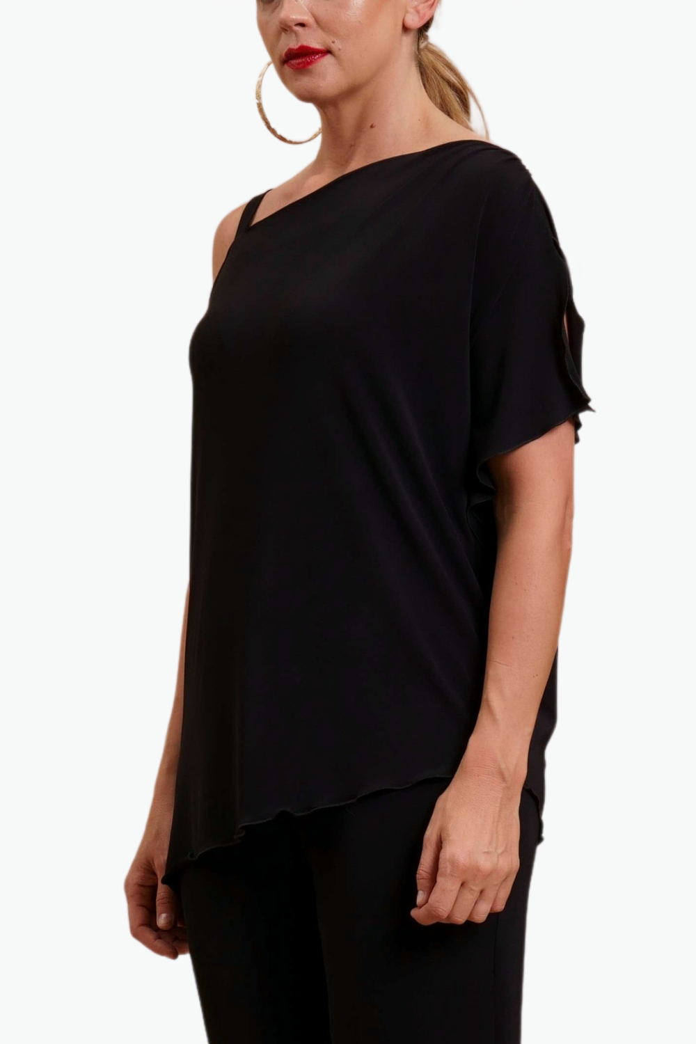 BLUSA ASIMMETRICA CON VOLANT