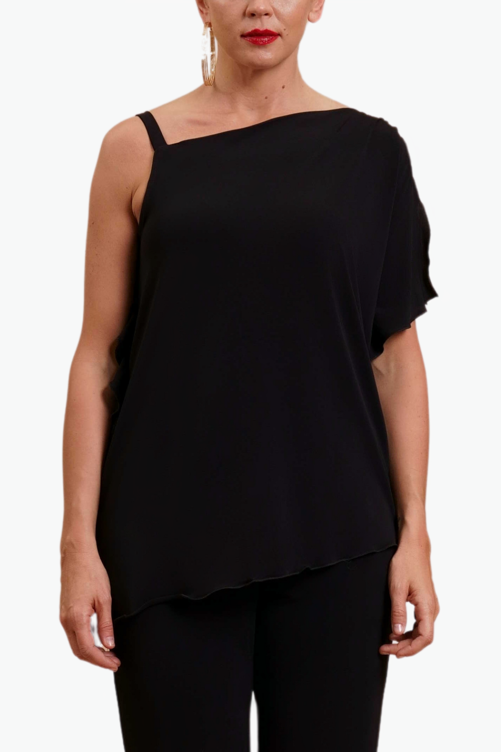 BLUSA ASIMMETRICA CON VOLANT
