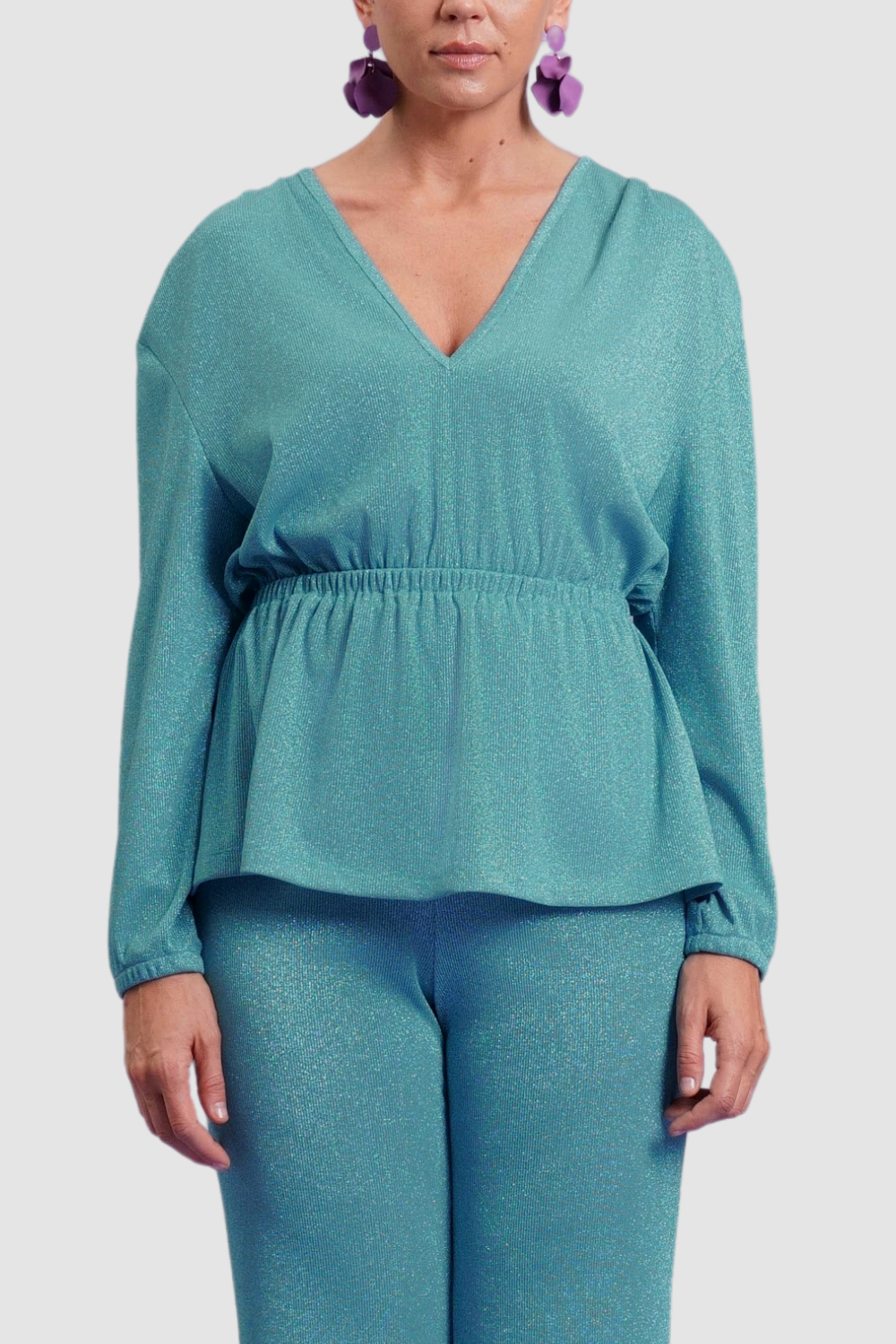 BLUSA CON BALZA ED ELASTICO