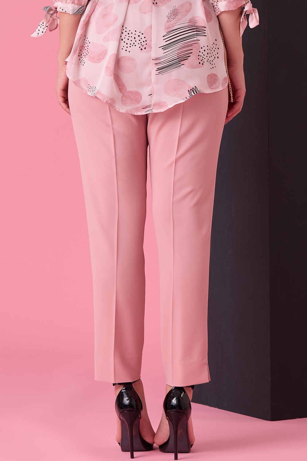 PANTALONE STRETTO CON SPACCHETTI