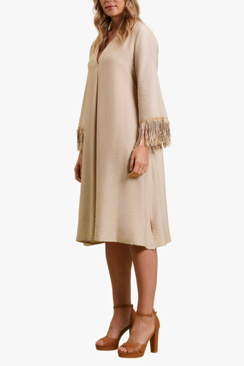 ABITO SVASATO CON SCOLLO A V